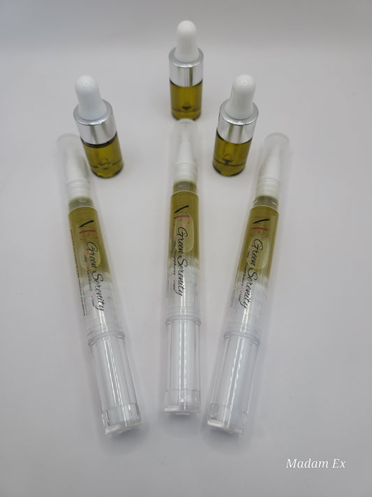 three cuticle oil pens and three mini droppers on a white background