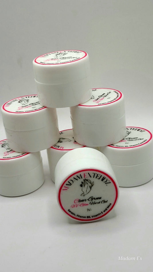 7 pc hard gel in white uv jars stack with one in the front with lable showing on white background