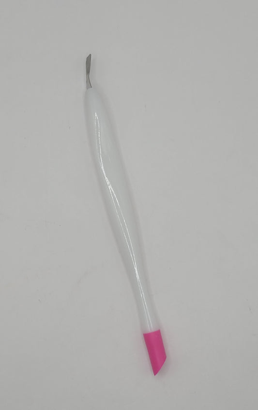 one pink and white duo cuticle trimmer/pusher on a white background