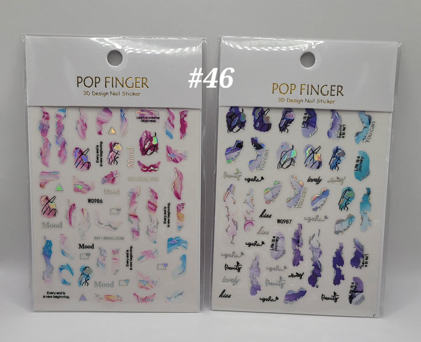 Two packages of Pop Finger nail sticker designs on a white background