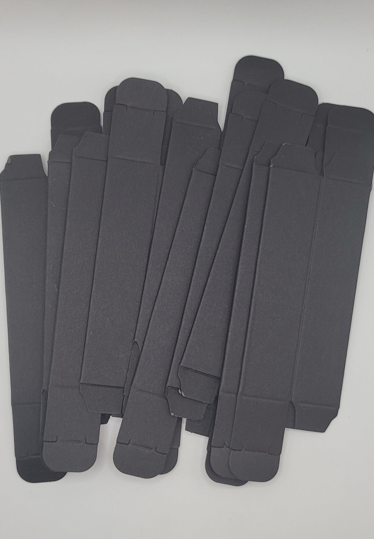 Set of black rectangular boxes on a white background