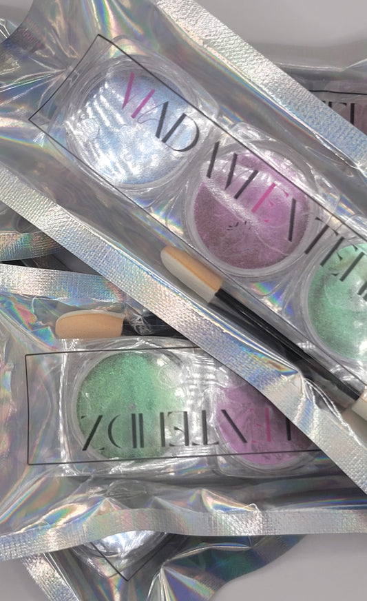 a pile of 3pcs packs of cat-eye powder