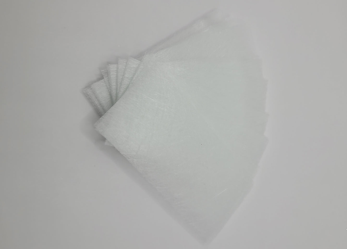 25 piece fiberglass nail extention on a white background