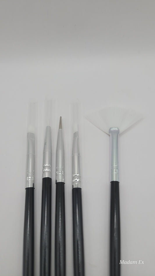 5pcs white tip black and silver nail art brush set on a white background