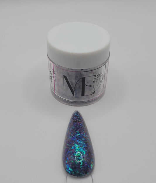 1 Jar of chameleon glitter Acrylic powder with 'ME' branding and a nail art swatchstick samples on a white background