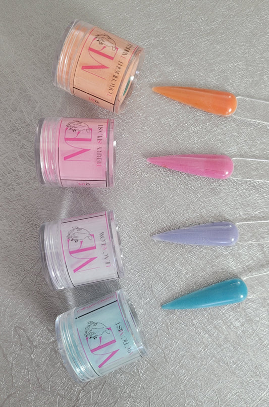 pink orange purple blue colored acrylic laying down with swatch stick on gray background