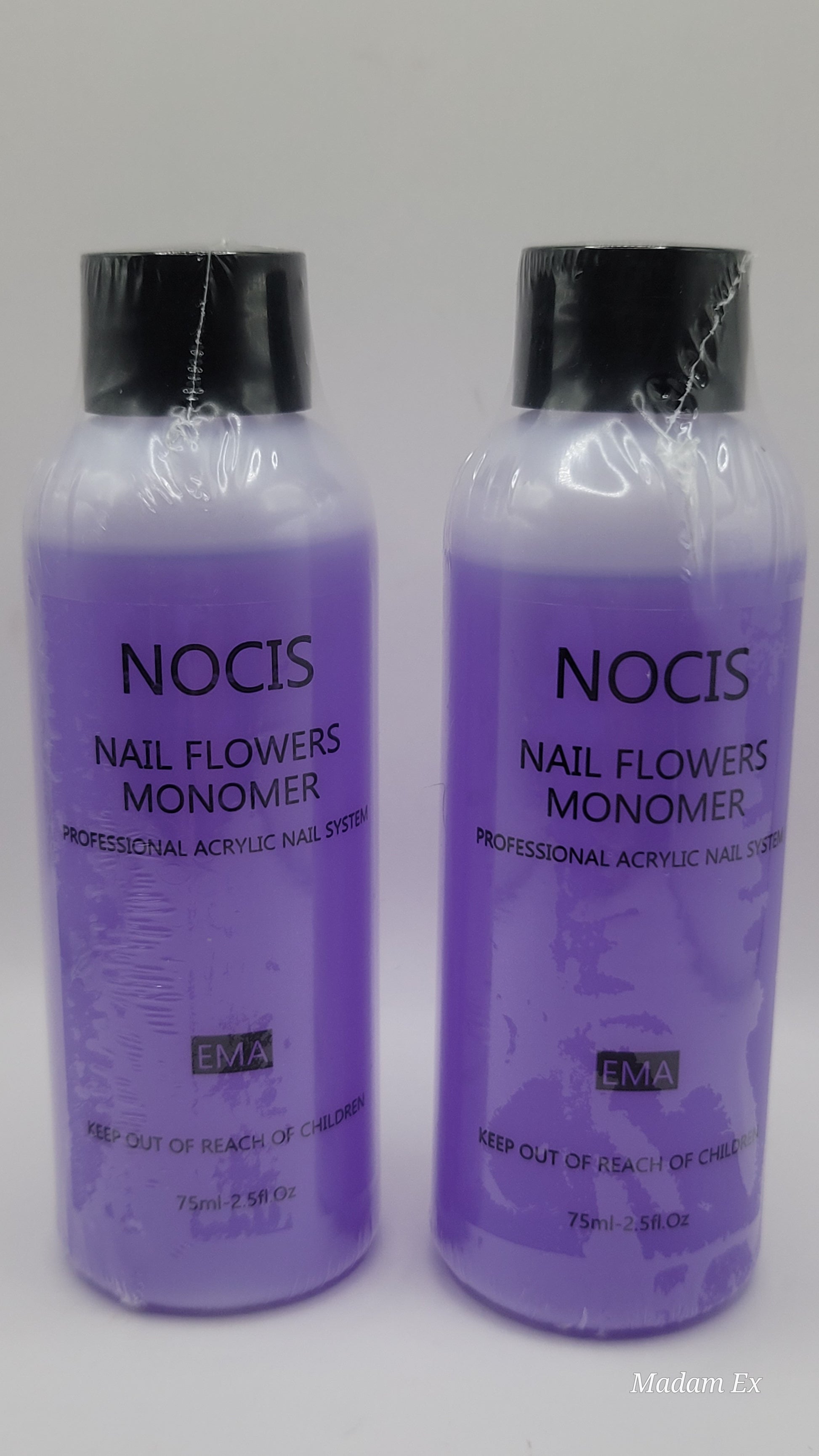 Two purple bottles of Nocis nail flower monomer on a white background
