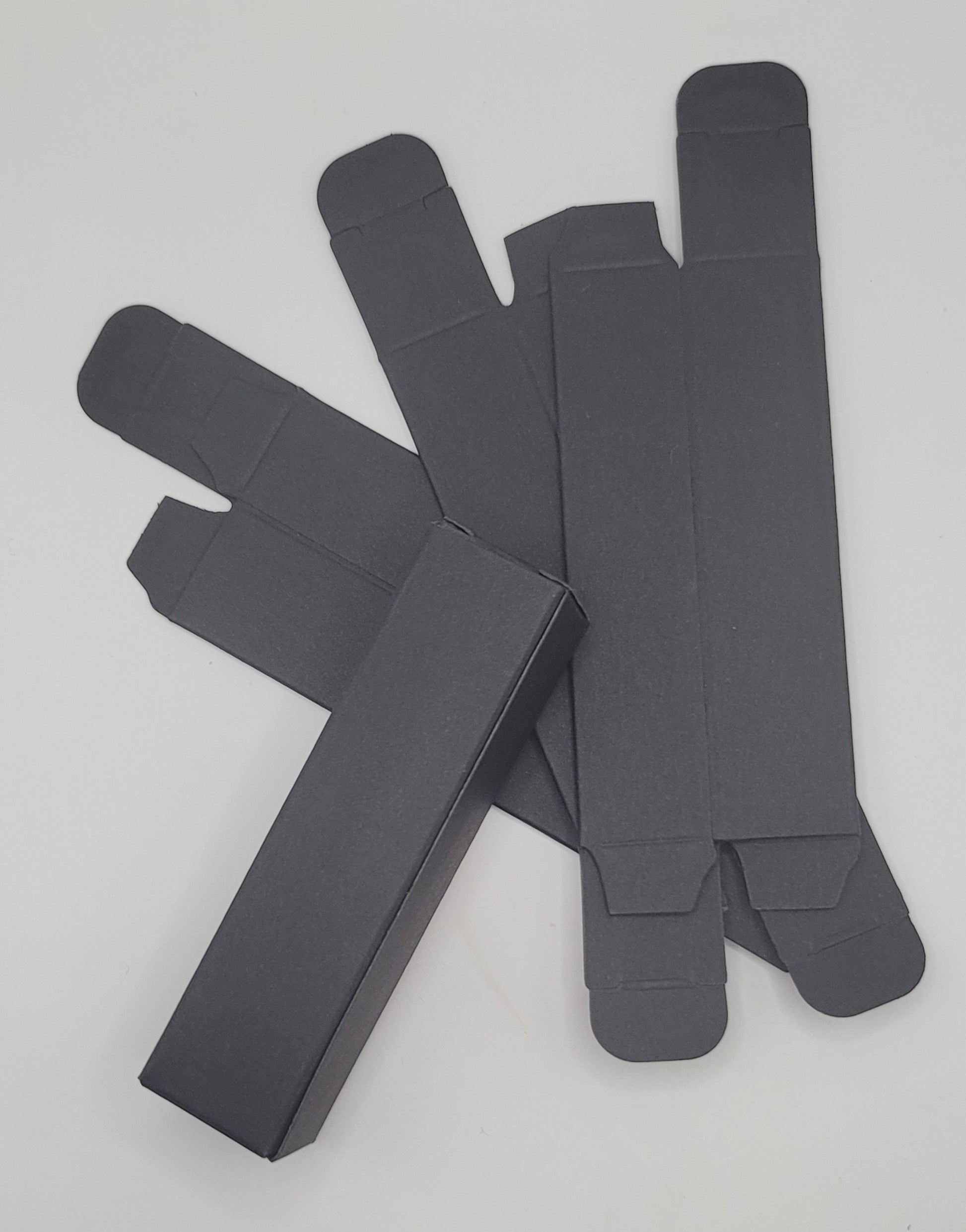 Black rectangular boxes on a light gray background