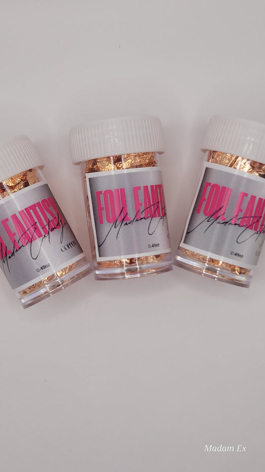 Three containers of foil fatasy with pink and black text on a light gray background