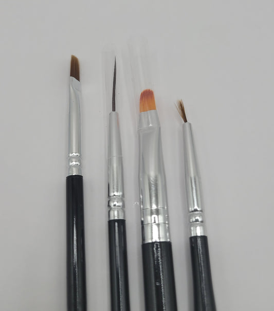 five black and silver nail art brushes on white background