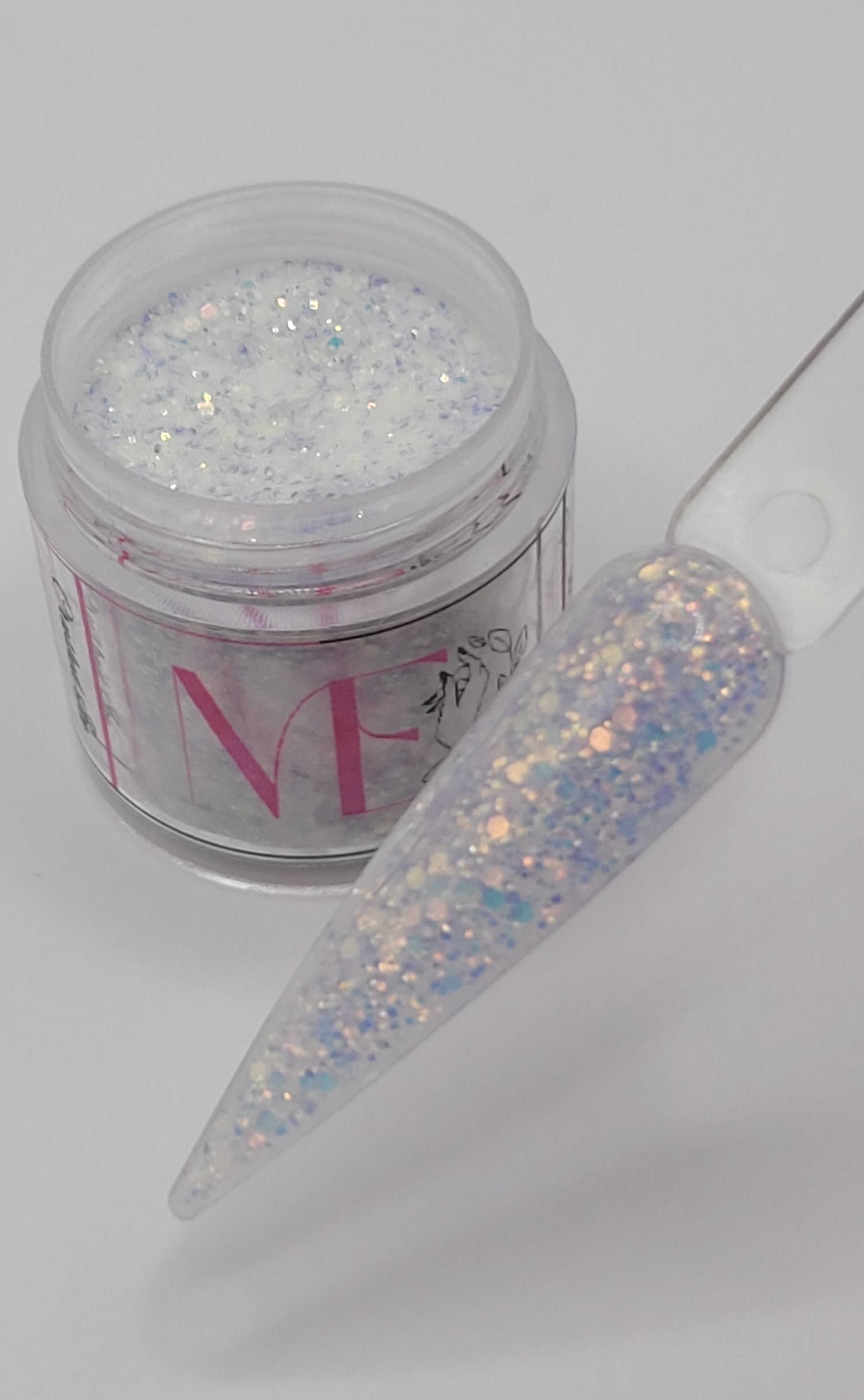 1 Jars of ice glitter acrylic powder with decorative 1 nail swatchsticks  on a white background