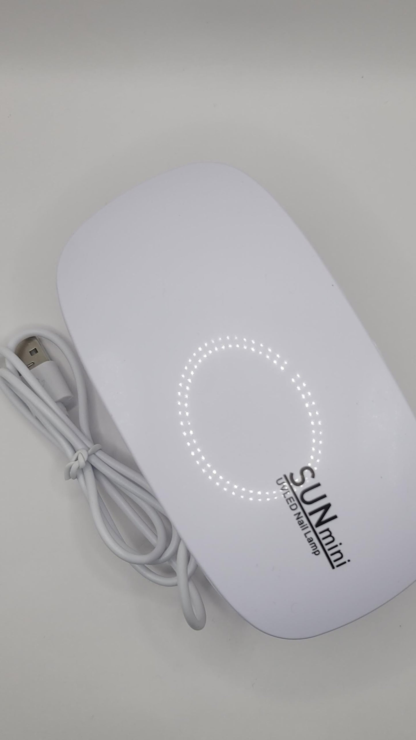 Travel size uv sun lamp- fast, even curing for gel dip nails!