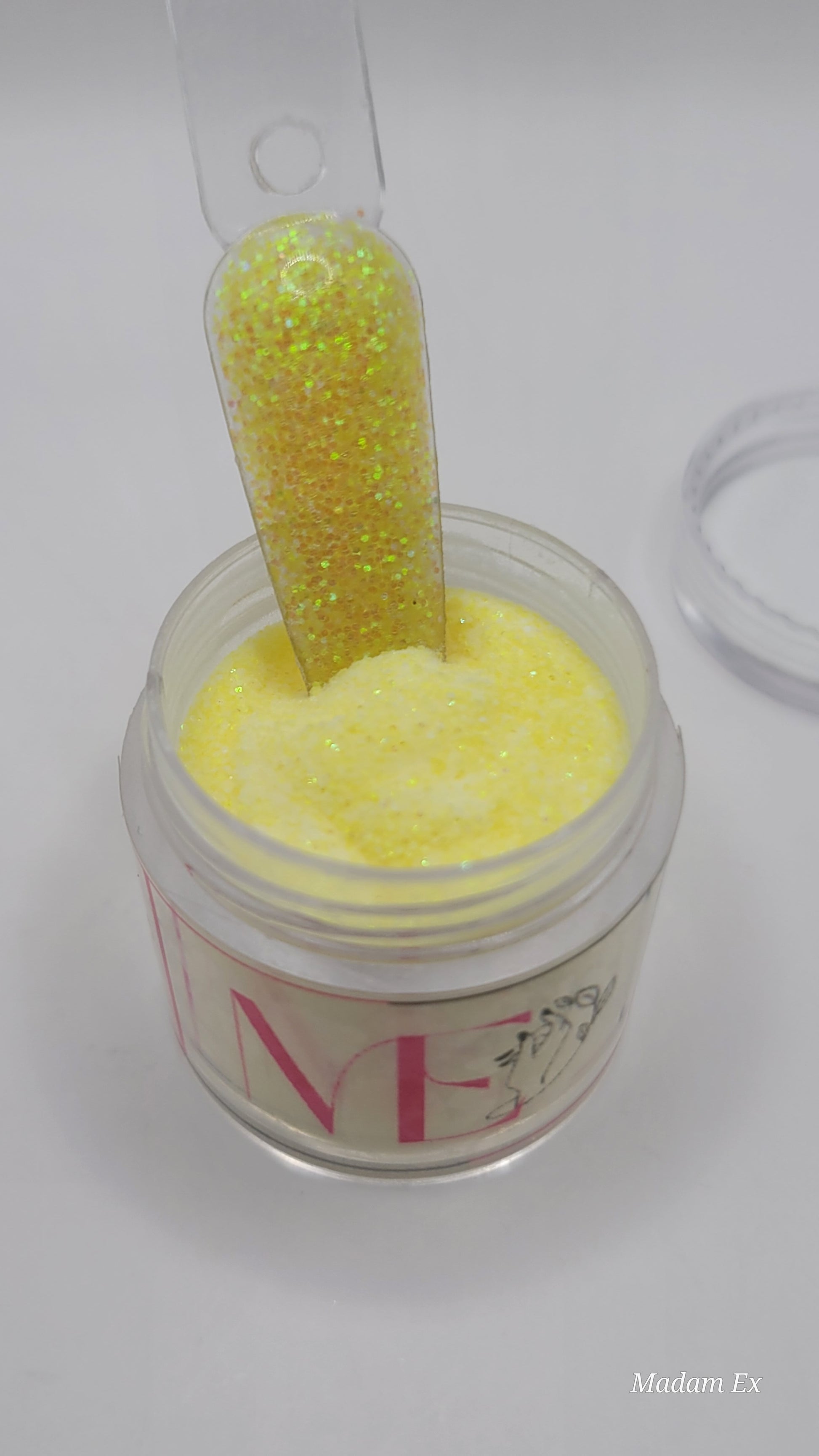 1 Jars of snow glitter acrylic powder with decorative 1 nail swatchsticks  on a white background